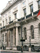 The frontage of
                              the Oxford and Cambridge Club on Pall
                              Mall